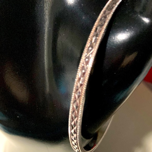 Monet silver tone bracelet. Beautifully etched. Previously owned bme2879